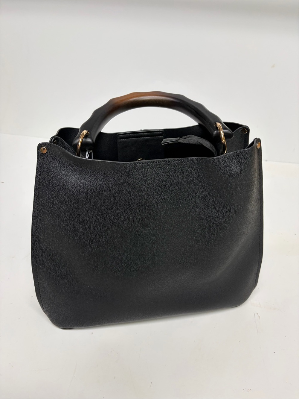 Charming Charlie Black Shoulder Bag with Wooden Handle Accent